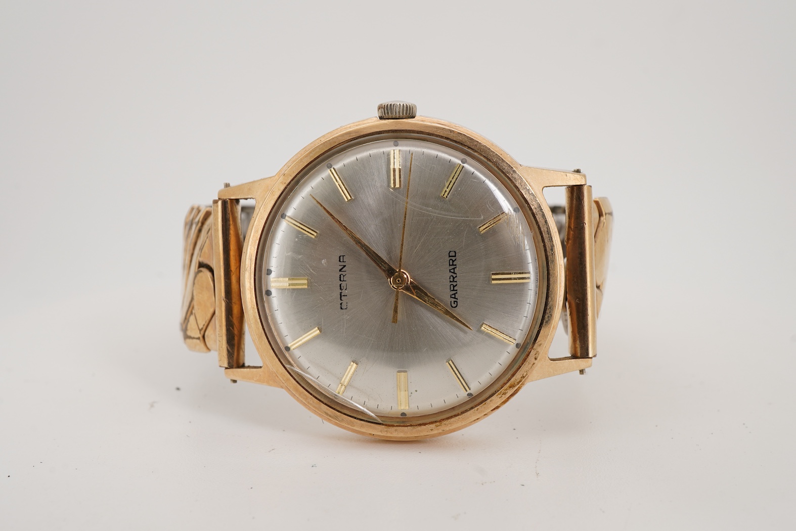 A gentleman's late 1960's 9ct gold Eterna manual wind wrist watch, retailed by Garrard